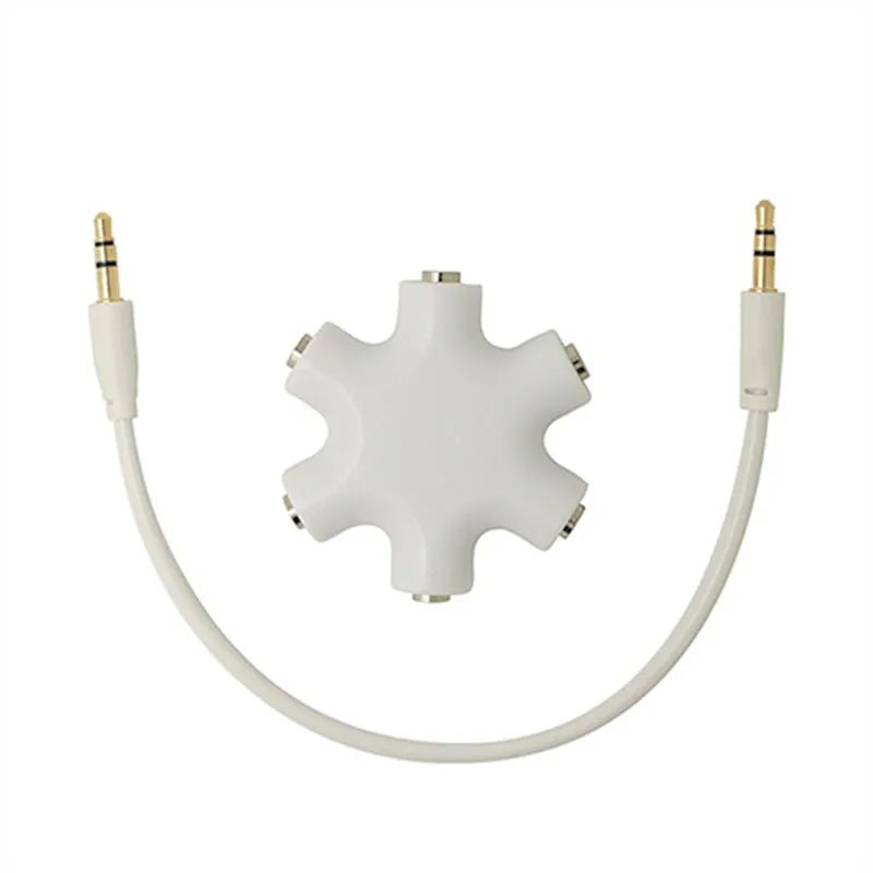 White 3.5mm audio splitter Kenya star hub with white cable and two gold-tipped male jacks, white background