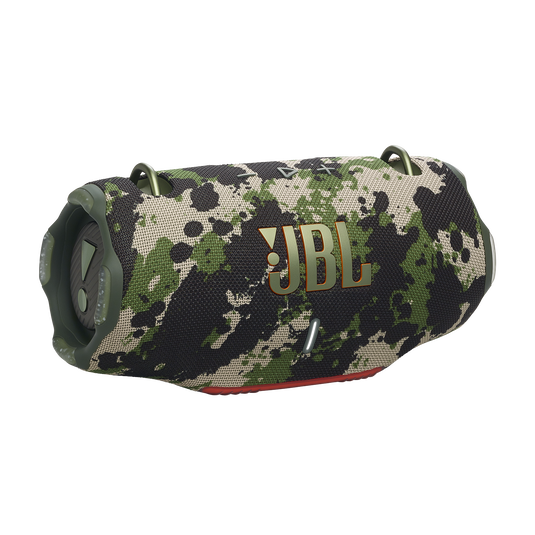 JBL Xtreme 4 portable Bluetooth speaker with a rugged design and integrated shoulder strap, set against an outdoor backdrop."