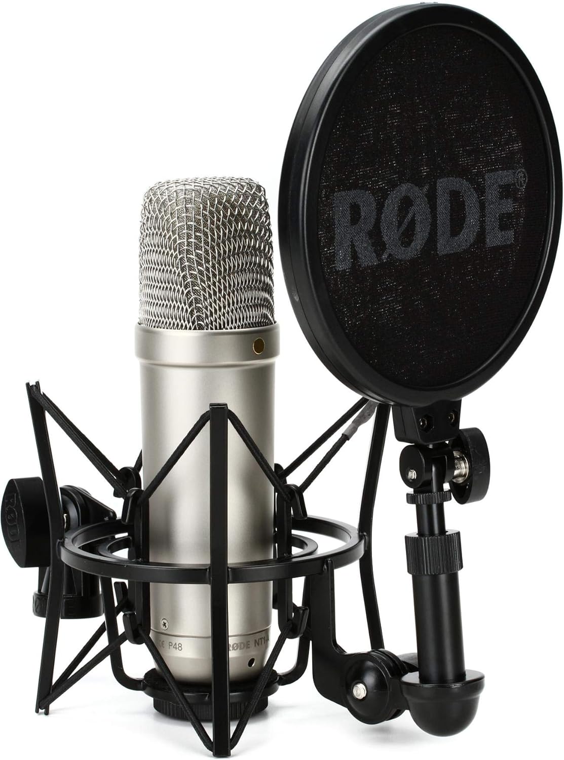 RØDE NT1-A microphone mounted in SM6 shock mount with pop filter in front, on a studio desk.”