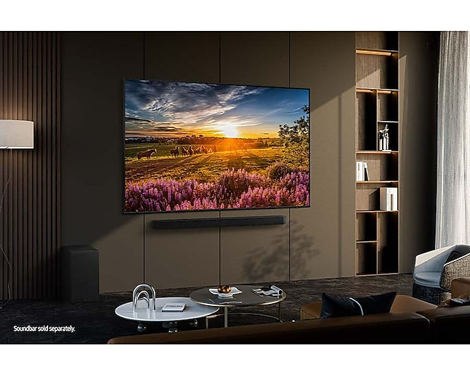 Samsung 65Q60DAU 65-inch QLED 4K Smart TV (2024) displayed in a modern living room, showcasing its ultra‑slim AirSlim design and vibrant QLED screen.