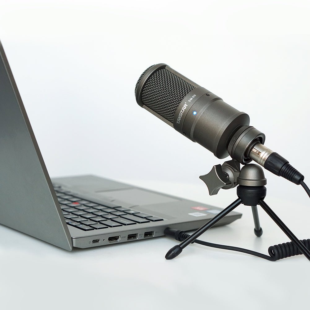 Takstar SM-8B 2nd Gen microphone Kenya — angled front view with round pop filter cap visible over metal mesh grille
