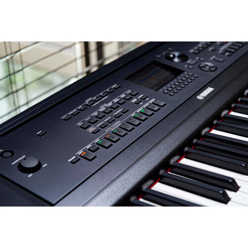 Yamaha DGX-670 keyboard close-up showing key action