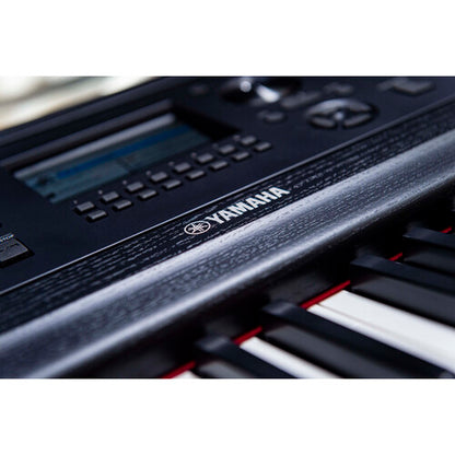 Yamaha DGX-670 keyboard close-up showing key action