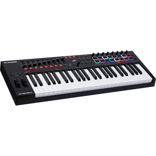 M-Audio Oxygen Pro 49 Kenya angled front view showing keys, RGB pads, knobs and faders