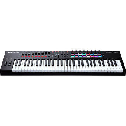 M-Audio Oxygen Pro 61 Kenya — elevated front-angle view showing full keyboard, faders, knobs and RGB pads