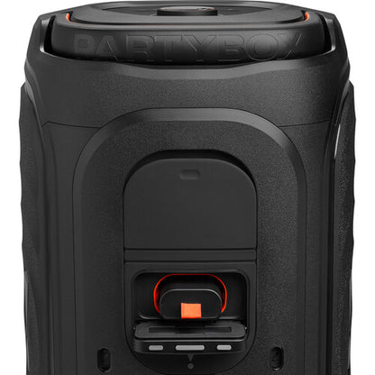 JBL PartyBox 130 Kenya rear close-up showing PartyBox embossed top lid and orange-accented battery compartment door`