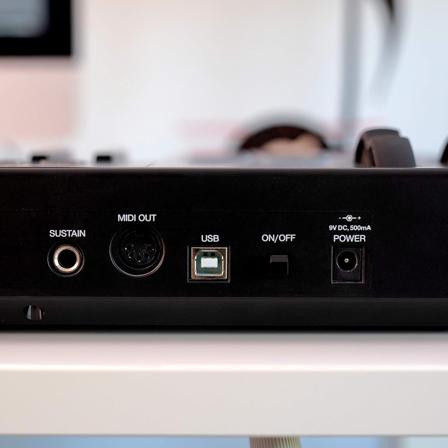 Rear panel of Alesis VI61 showing USB and 5‑pin MIDI Out.