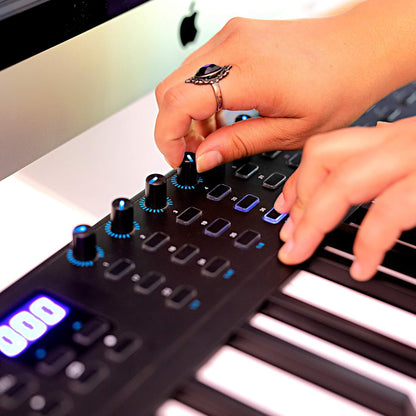 Alesis VI61 top view showing pads, knobs and transport controls.