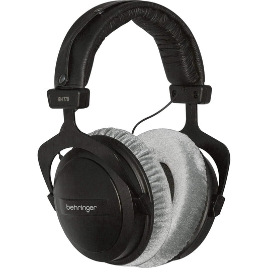 Front view of black Behringer BH770 closed-back circumaural headphones on a white background.