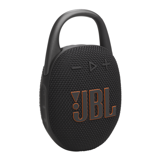 JBL Clip 5 speaker in red clipped to a backpack strap with its integrated carabiner visible
