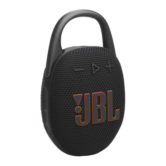 JBL Clip 5 speaker in red clipped to a backpack strap with its integrated carabiner visible