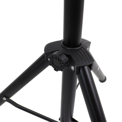 Adjustable music stand with perforated metal desk and folding tripod base, full height view