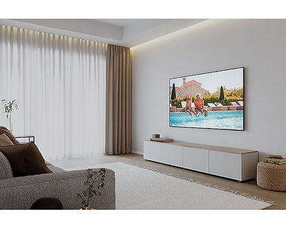amsung 55DU8000 55-inch 4K UHD Smart TV showcasing its slim design and vibrant display in a modern living room.