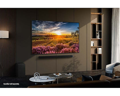 Samsung 65Q60DAU 65-inch QLED 4K Smart TV (2024) displayed in a modern living room, showcasing its ultra‑slim AirSlim design and vibrant QLED screen.