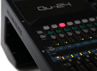 Allen Heath Qu-24 Kenya close-up of layer select buttons and illuminated amber faders with channel strip labels