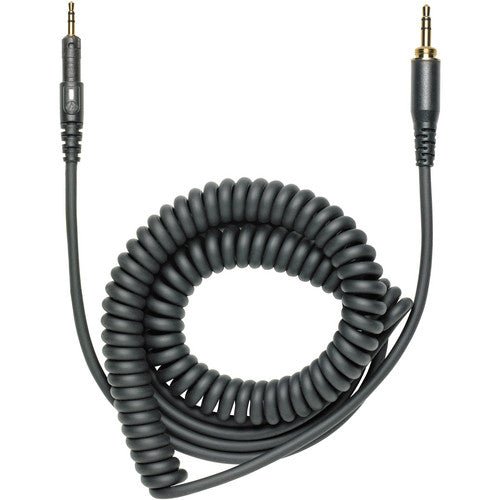 Audio-Technica ATH-M50x Kenya included coiled detachable cable with dual 3.5mm gold-plated connectors on white background