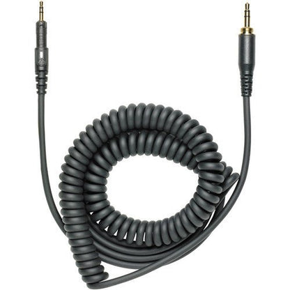 Audio-Technica ATH-M50x Kenya included coiled detachable cable with dual 3.5mm gold-plated connectors on white background