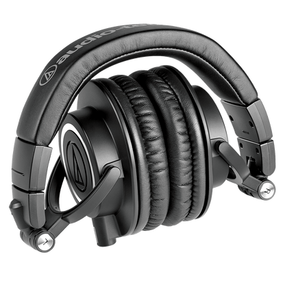 Audio-Technica ATH-M50x Kenya folded compact position showing collapsible design, earcups and Audio-Technica logo on headband