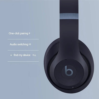 Beats Studio Pro Kenya earcup close-up showing one-click pairing, audio switching and Find My Device features