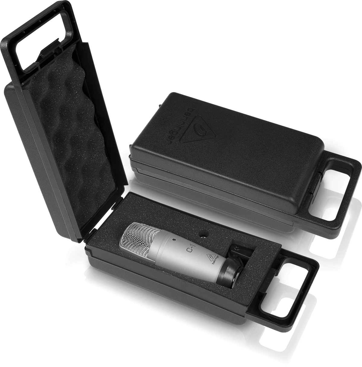 Behringer C-1 condenser mic Kenya stored in open foam-lined hard case — protective storage view