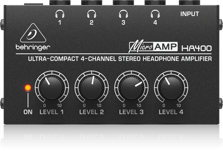 Behringer HA400 headphone amplifier Kenya — angled top view showing 4 volume knobs and headphone jacks on metal chassis