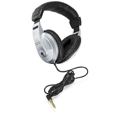 Behringer HPM1000 Kenya angled view from above showing adjustable headband and coiled cable with gold jack