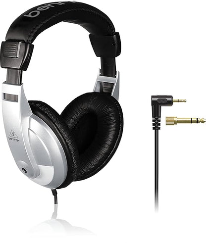 Behringer HPM1000 Kenya side profile showing silver ear cup with 3.5mm and 6.35mm adapter connectors displayed