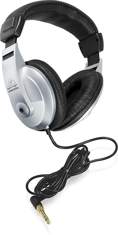 Behringer HPM1000 Kenya three-quarter view showing HPM1000 model label on silver ear cup with full cable length