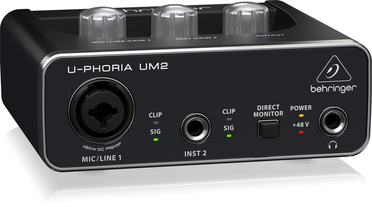 Behringer UM2 Kenya — left-angle view showing XLR/Line 1, Inst 2 inputs, Direct Monitor, +48V, and headphone jack