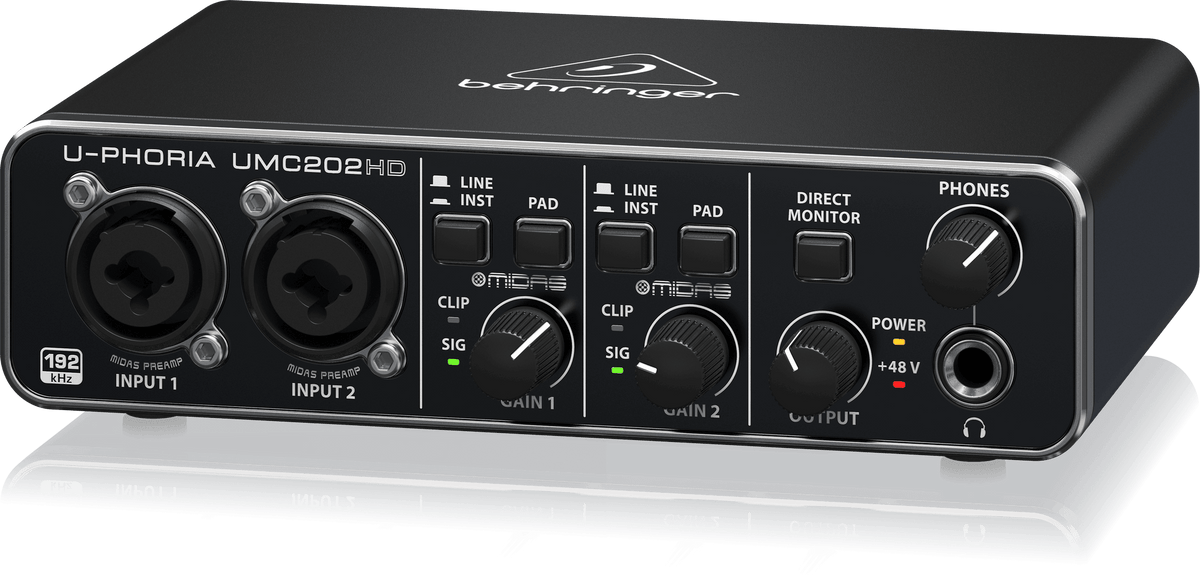 Right-angle view of Behringer UMC202HD Kenya showing front panel controls, output knob, direct monitor switch and metal chassis