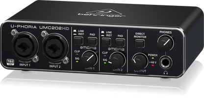 Right-angle view of Behringer UMC202HD Kenya showing front panel controls, output knob, direct monitor switch and metal chassis