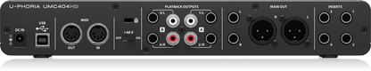 Behringer UMC404HD Kenya — rear panel showing USB port, MIDI I/O, RCA outputs, XLR main out, and inserts