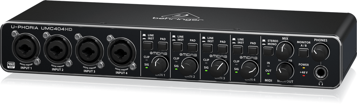 Behringer UMC404HD Kenya — right-angle view showing monitor mix knob, headphone output, and power section