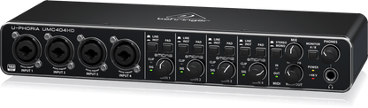 Behringer UMC404HD Kenya — right-angle view showing monitor mix knob, headphone output, and power section