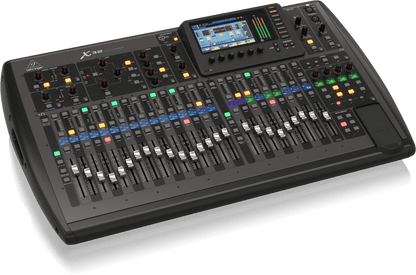 Behringer X32 digital mixer Kenya — left-side perspective showing full channel layout, faders and angled console profile