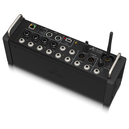 Behringer XR12 digital mixer channel faders and LCD display close-up