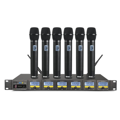 BNK X85 6 in 1 wireless microphone system Kenya — six UHF handhelds standing upright in front of rack receiver
