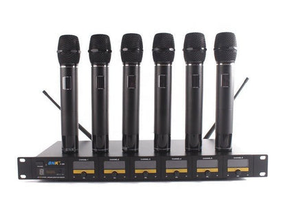 BNK X85 6 in 1 wireless microphone system Kenya — angled front view of all six mics alongside the UHF receiver unit
