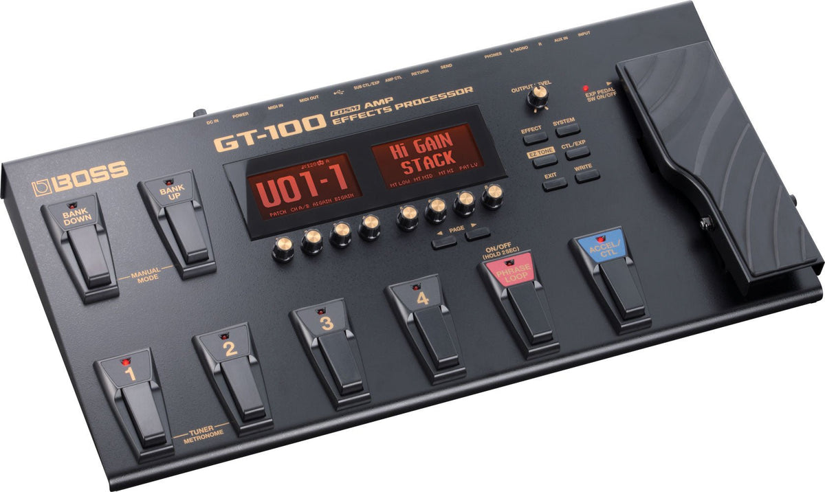 Boss GT-100 Kenya angled front view showing dual LCD displays, 6 footswitches, knobs and expression pedal
