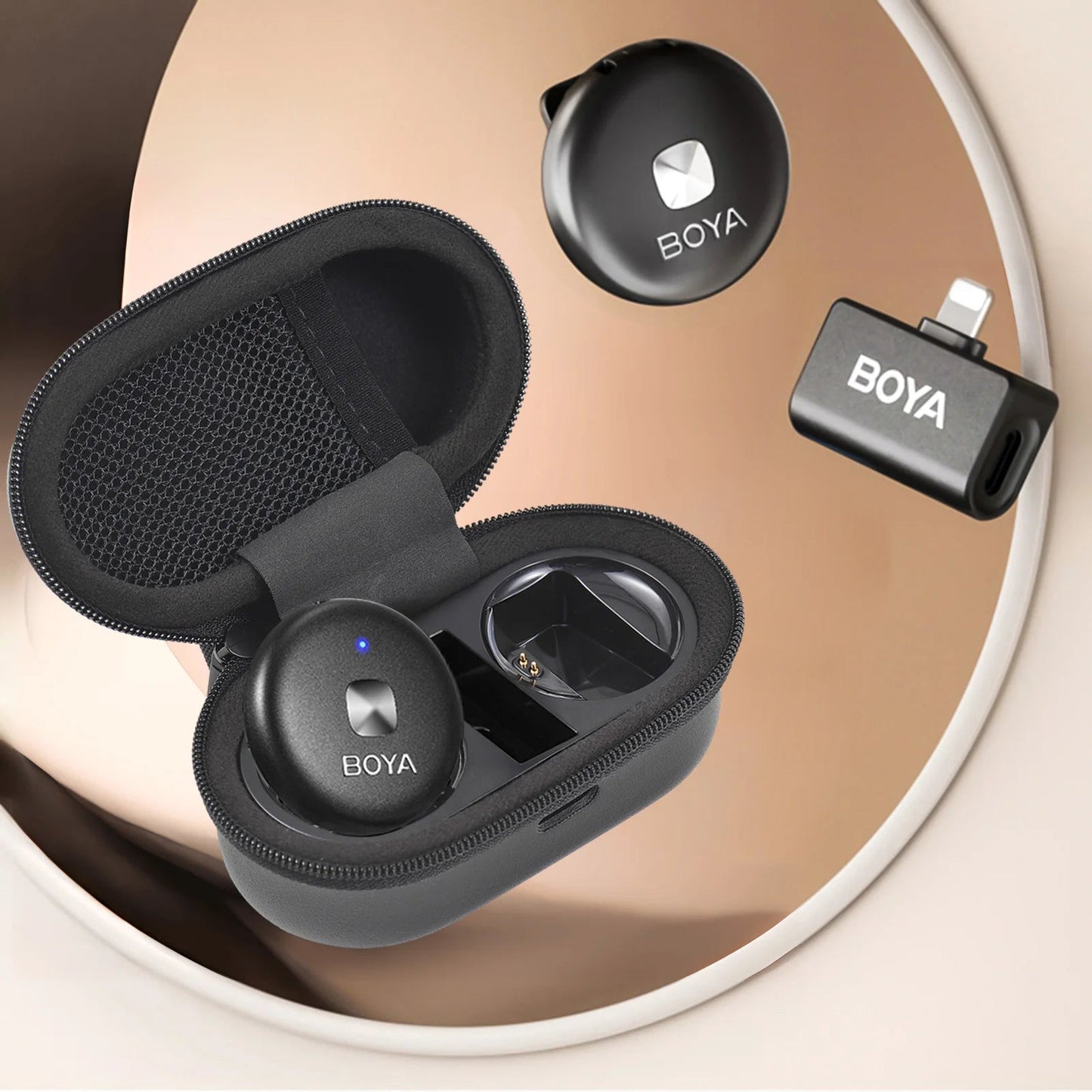 BOYA wireless mini microphone Kenya showing compact transmitter disc and magnetic clip design close-up