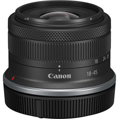 Canon EOS R100 Camera Kenya angled Canon RF-S 18-45mm lens showing Canon branding and red mount mark