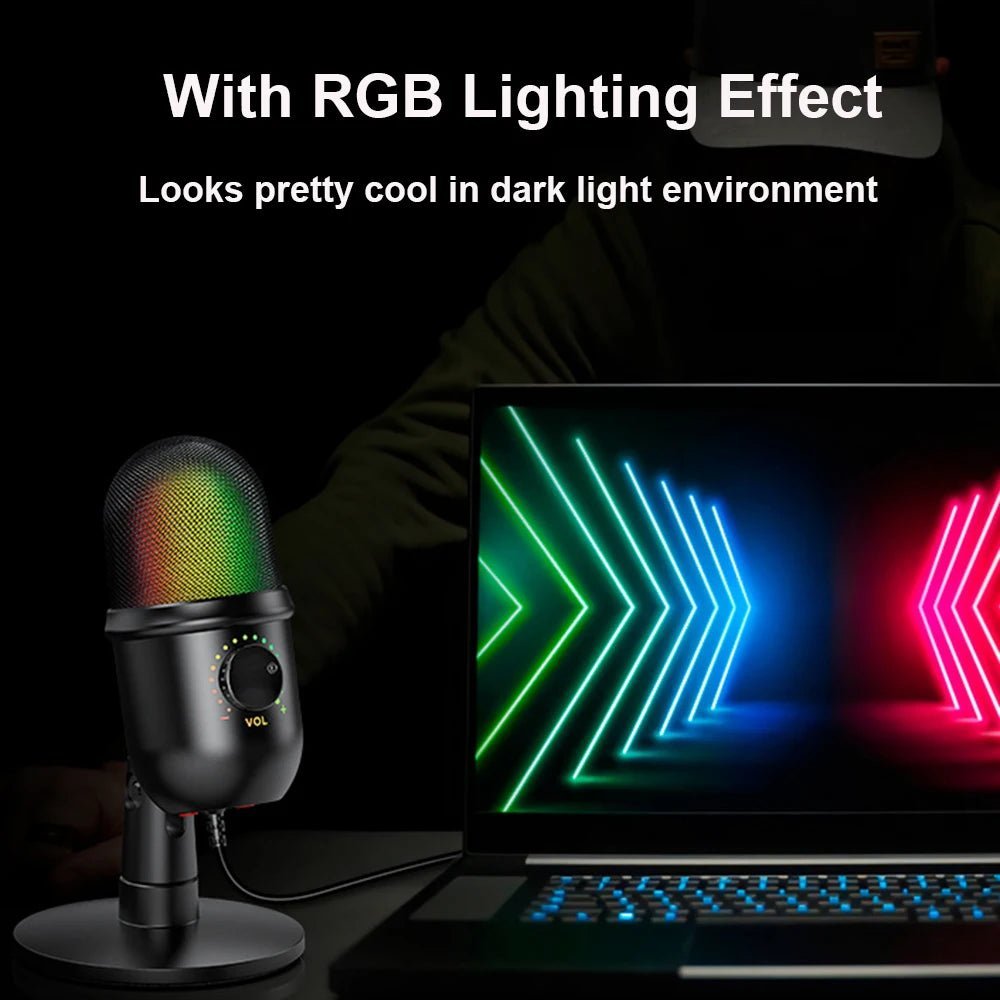 USB condenser microphone Kenya with RGB lighting effect glowing in dark gaming setup beside a monitor