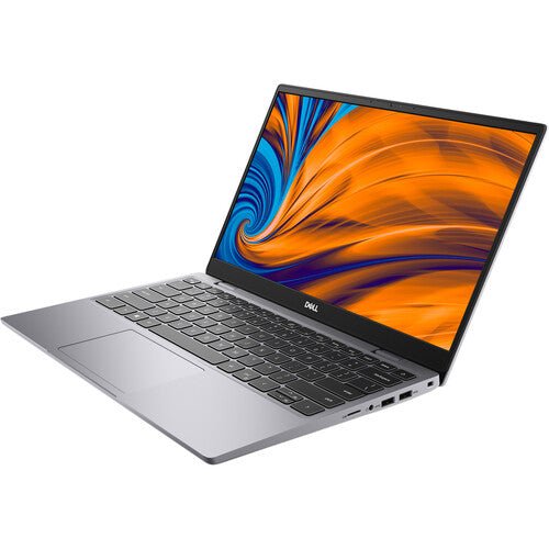 Dell Latitude 3320 Kenya – left-side angle view, open lid, keyboard deck and trackpad visible, silver chassis