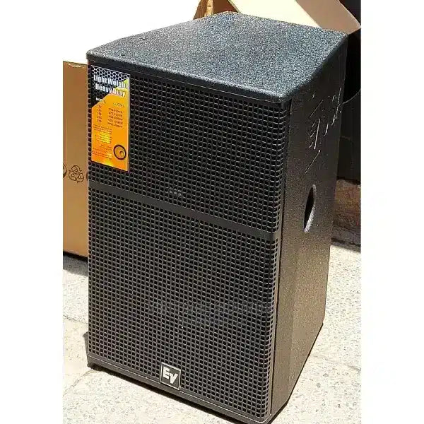 Black speaker with a brand label on a white background