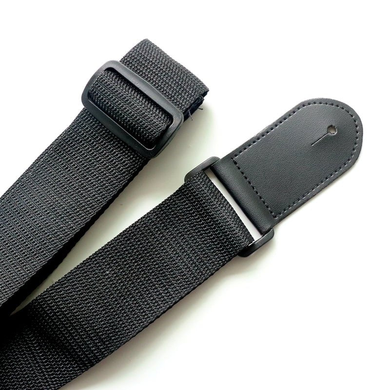 Fender guitar strap in black woven polyester with reinforced leather ends, full length view