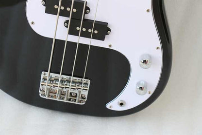 Fender Precision Bass Kenya black body closeup showing split single-coil pickup, chrome bridge and control knobs