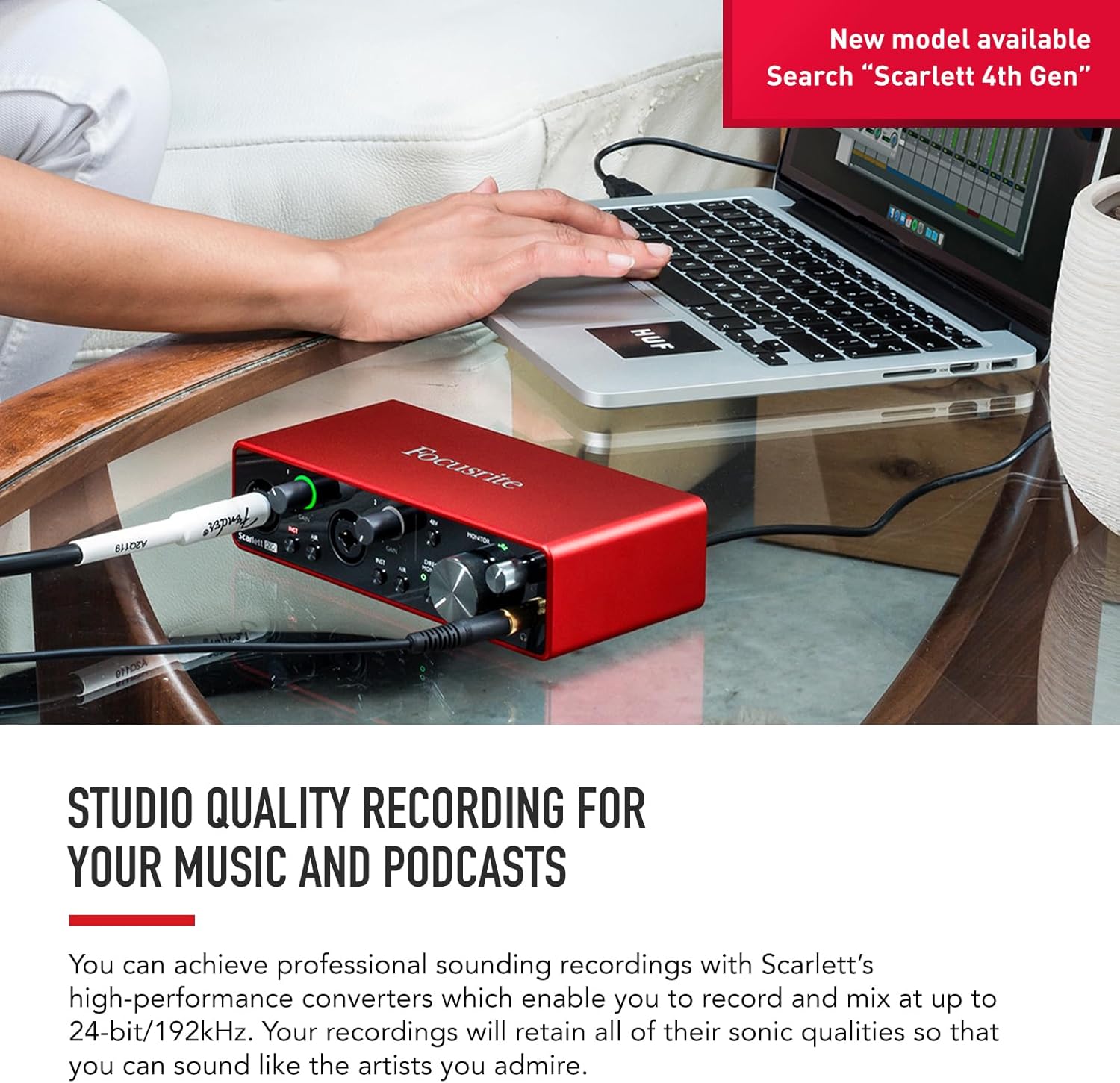 Focusrite Scarlett 2i2 Kenya connected to laptop with XLR mic and cable on desk — studio quality recording setup