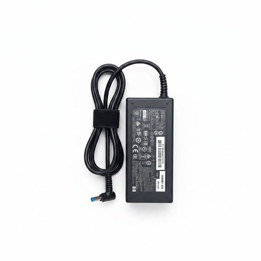 HP Blue Pin Charger 65W Kenya – black AC adapter with blue barrel tip and coiled power cable on white background