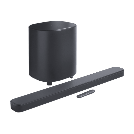 Soundbar + subwoofer at an angle with remote control visible