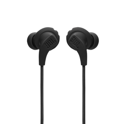 JBL Endurance Run 2 Wired earphones worn during a workout, showing FlipHook secure behind-ear fit